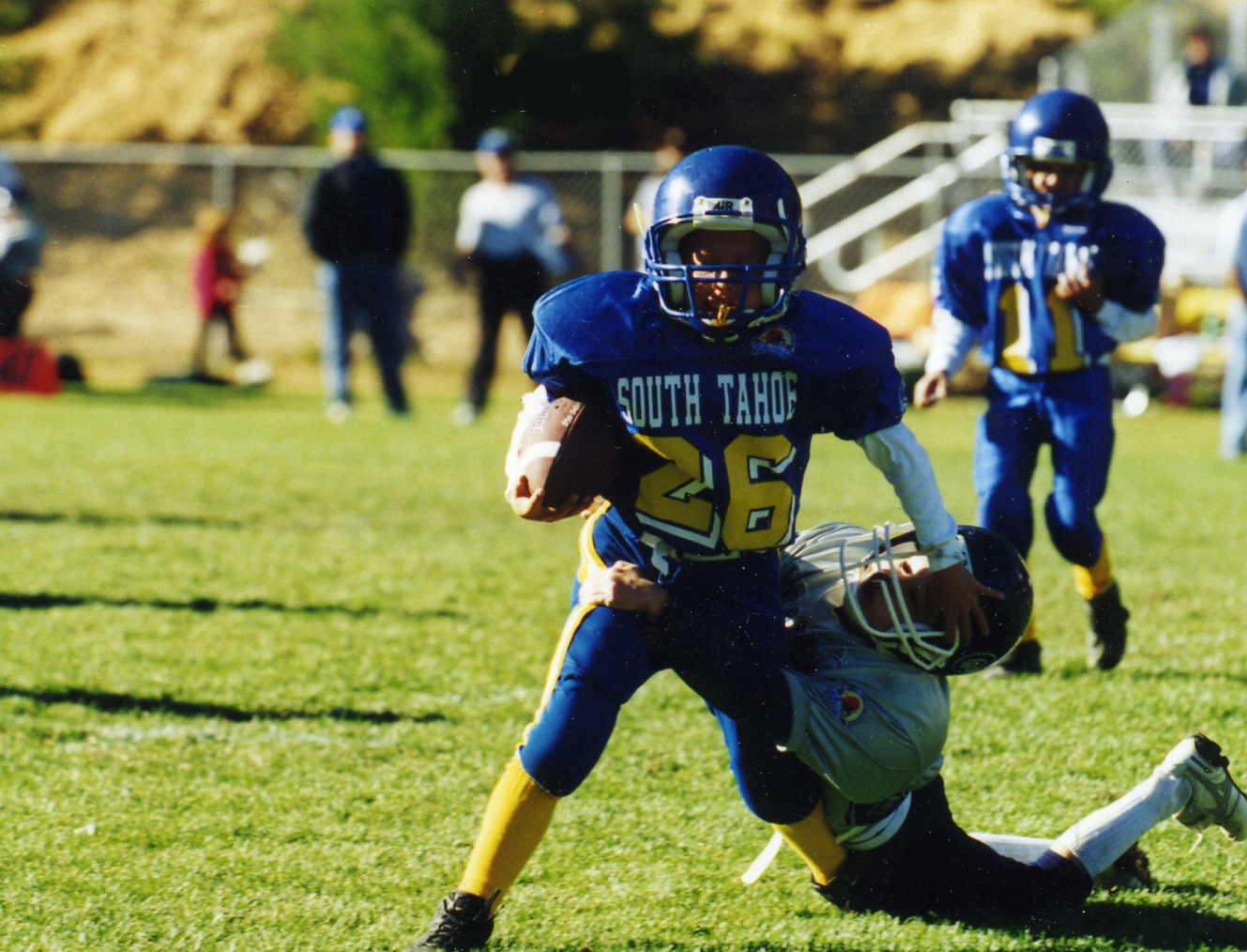 Youth football players on a field